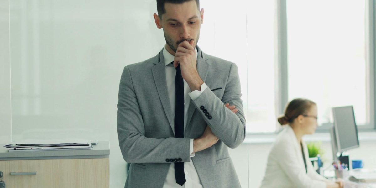 A confident professional making informed decisions, illustrating the value of understanding AI's history to avoid past mistakes.
