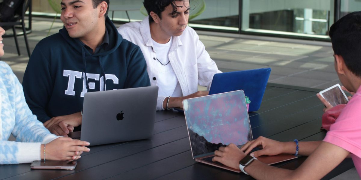 People engaging in collaborative learning, exploring diverse educational resources and platforms.