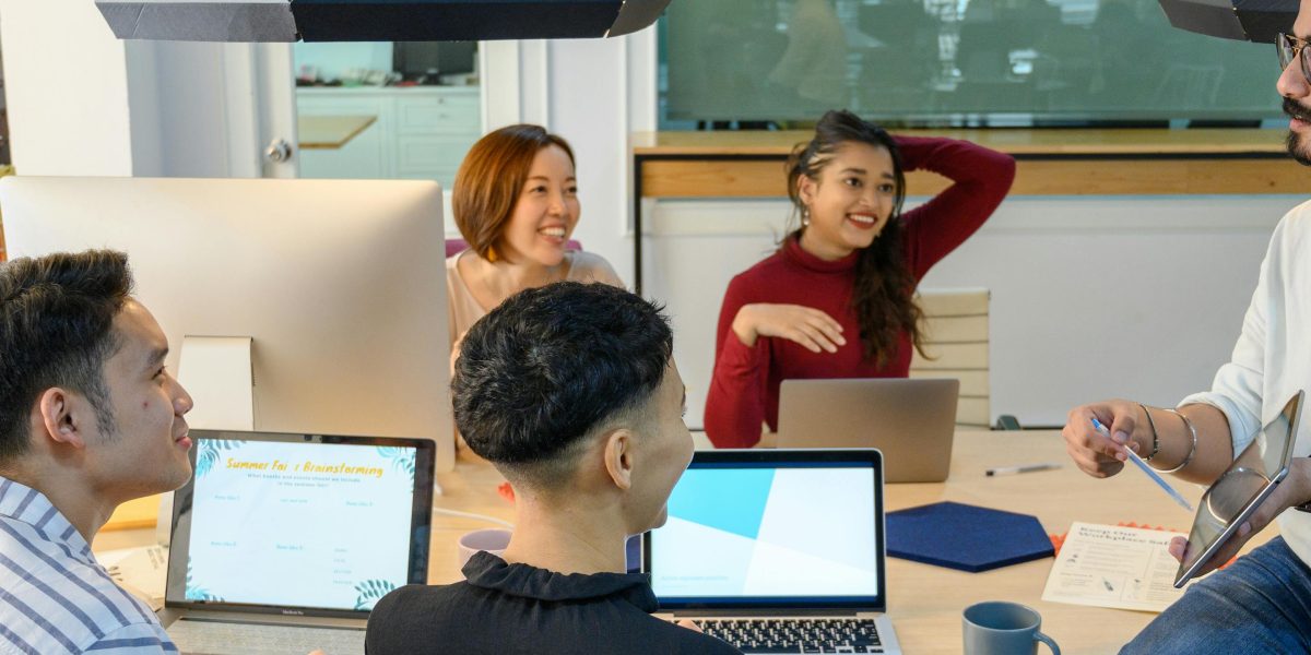 A team actively brainstorming, symbolizing the collaborative effort and strategic thinking required to integrate new AI development platforms effectively.