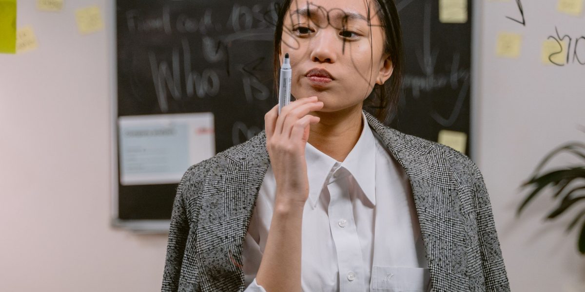 An individual contemplating career choices and planning their professional development.