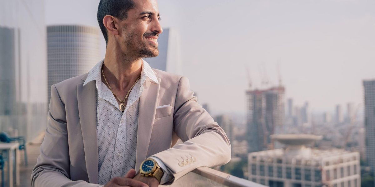 An entrepreneur confidently reviewing business growth metrics, enabled by automation.