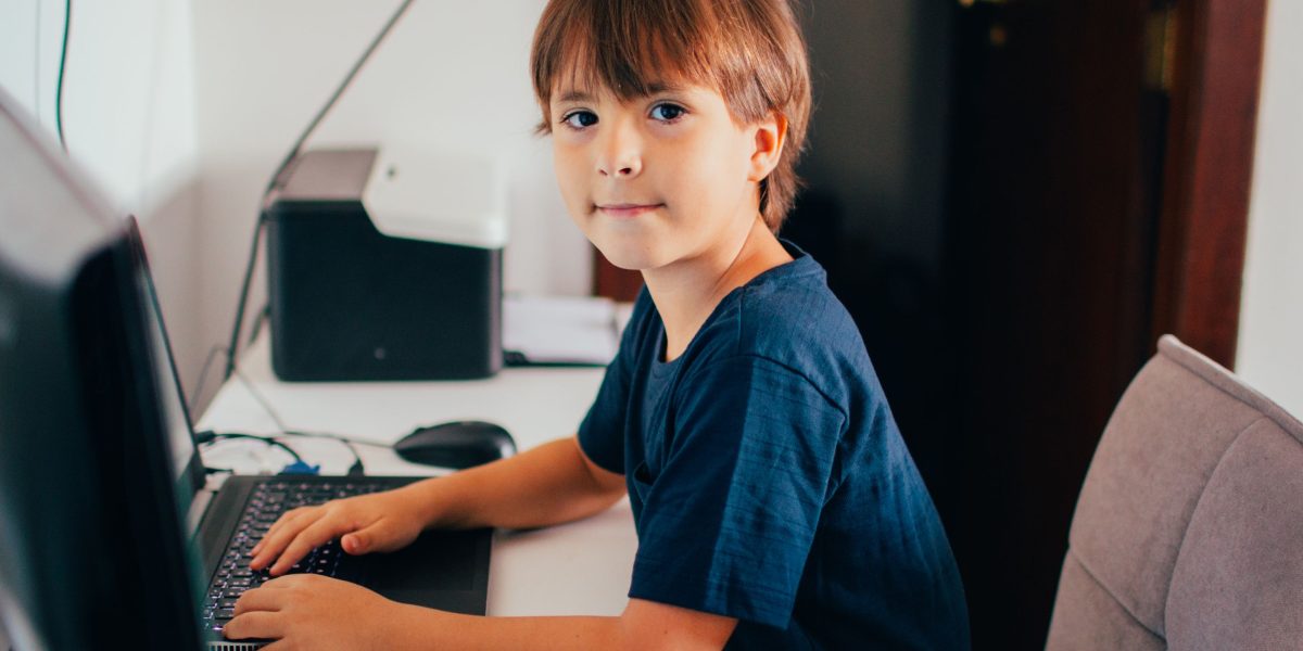 A person engaged in focused online learning, symbolizing dedication to acquiring new AI skills.