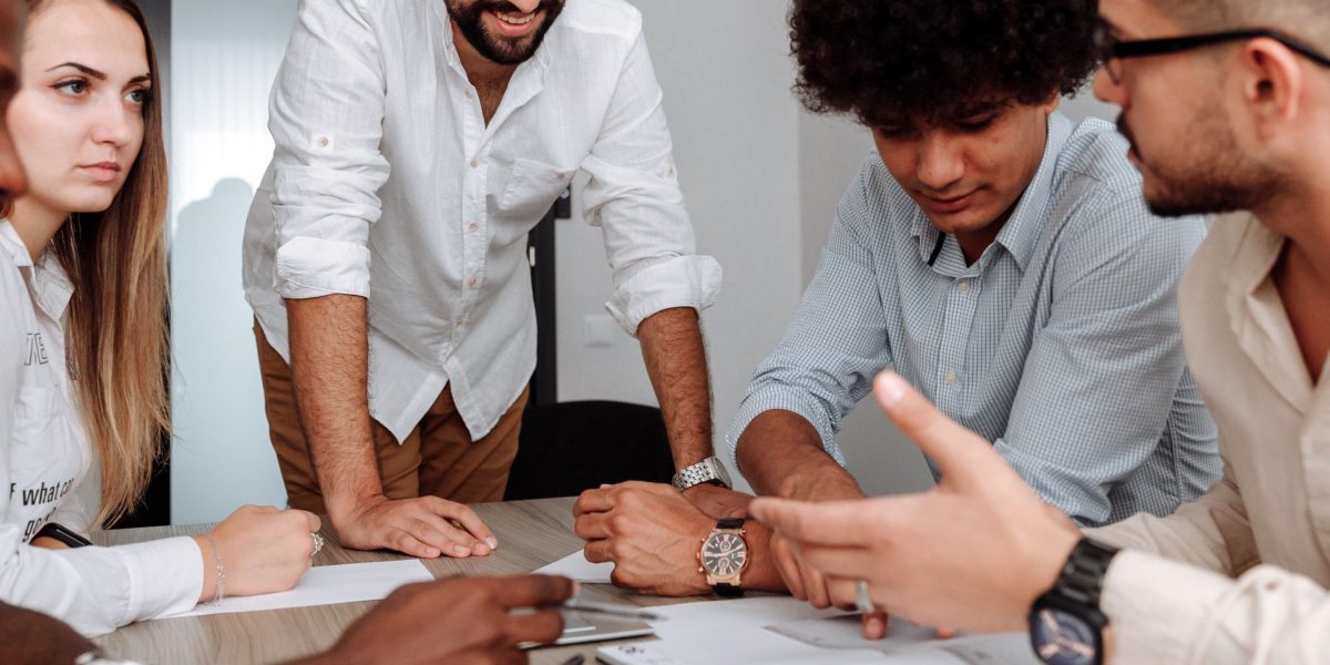Individuals engaged in a lively discussion, fostering community-driven learning.