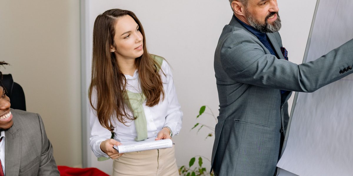 A professional presenting data on the success and value of corporate training programs.