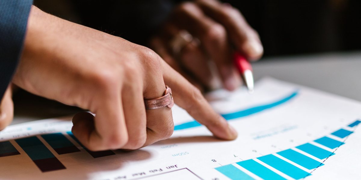 Business leaders thoughtfully evaluating various options to determine the best strategic choices for their organization.