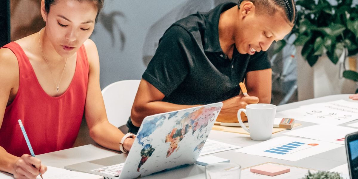 A focused team actively collaborating to integrate new smart technologies into their existing development workflows.