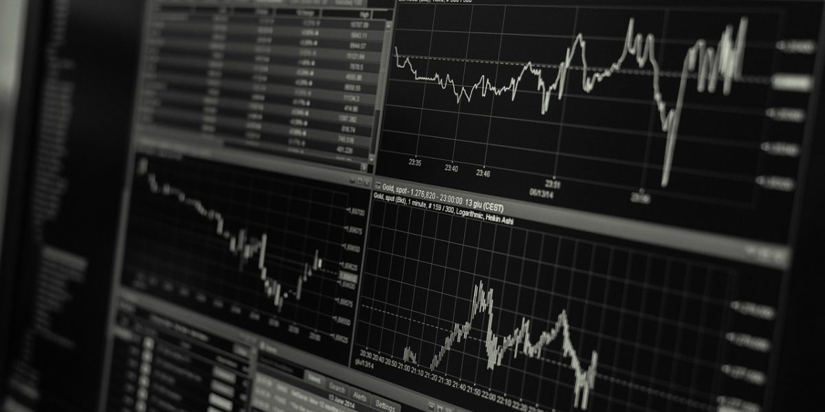 Business leaders analyzing financial data to understand the unit economics and profitability of AI products.