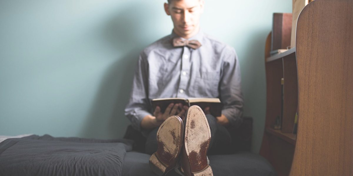 A person focused on learning new skills online, reflecting continuous professional development.