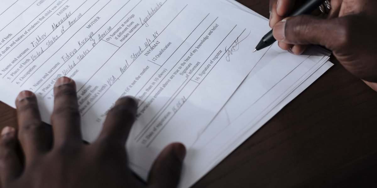 A focused individual conducting thorough due diligence to verify company information.