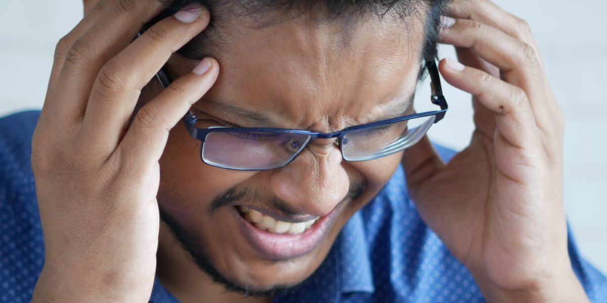 A person looking at many options, symbolizing the challenge of choosing the right AI tools amidst rapid innovation.