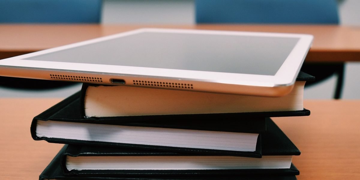 A focused professional engages in online learning to acquire new skills for career growth.
