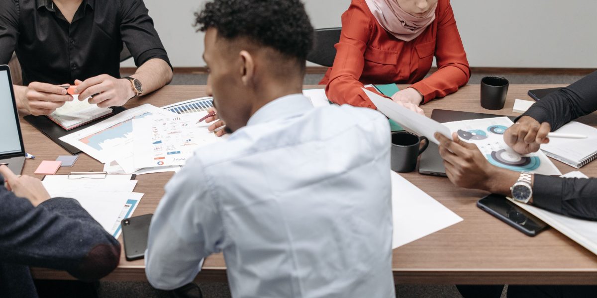 A diverse team collaborating, symbolizing the varied technical skills needed in top engineering firms.