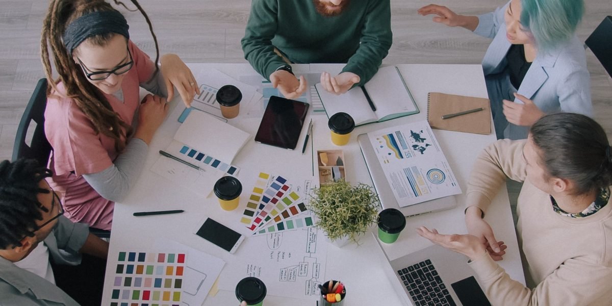 A team collaborates effectively, demonstrating the increased productivity and smooth workflows enabled by specialized engineering teams.