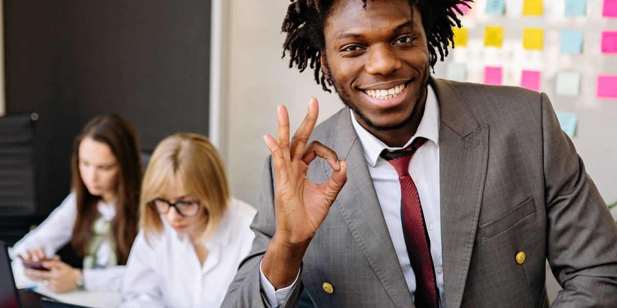 A confident professional celebrating a significant career milestone or educational achievement.