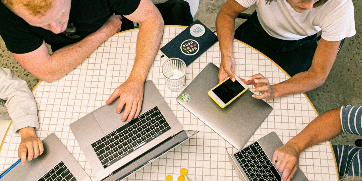 A remote team effectively using asynchronous communication tools to collaborate across different locations and time zones.